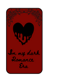 Red card with a black heart and text 'In my dark Romance Era' on a white background